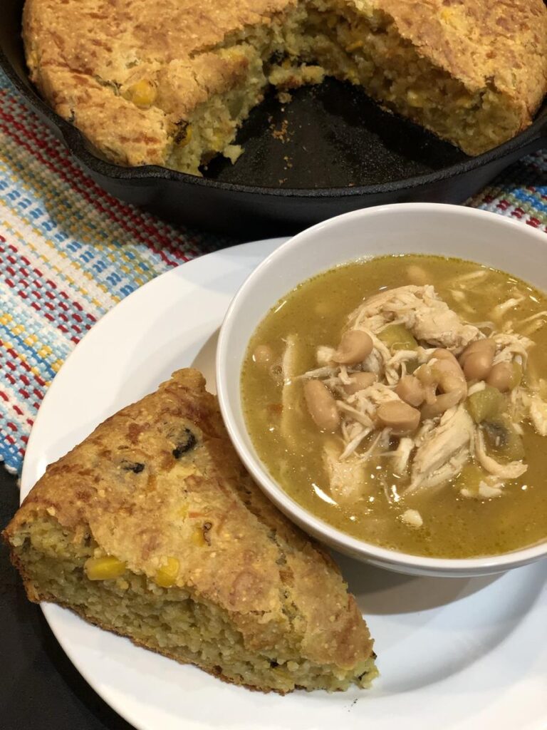 Gluten Free Mexican Cornbread on a plate with chili