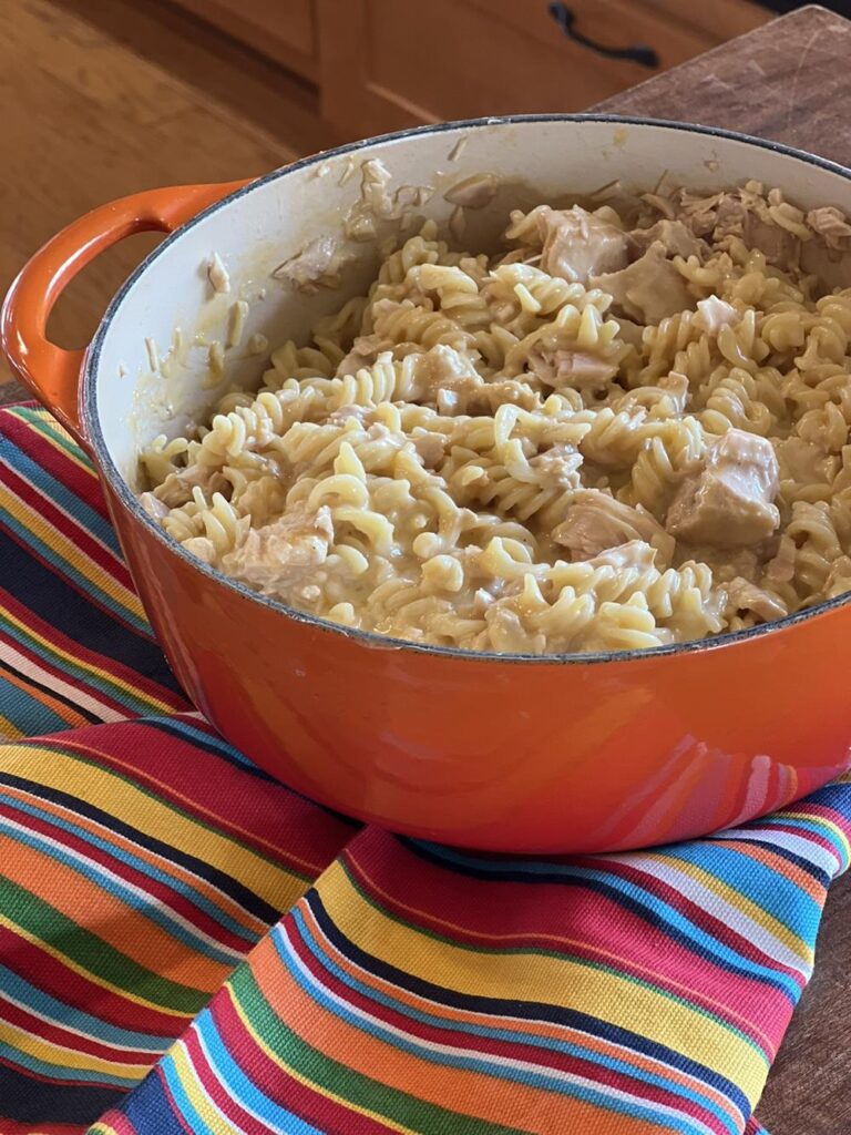 Gluten Free Tuna Helper in red pot with striped napkin